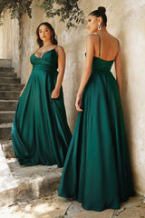this dress features a sweetheart neckline and a flowy skirt with an elegant leg opening