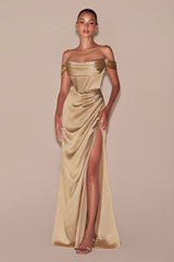 structured boned bodice is draped with a cowl neckline