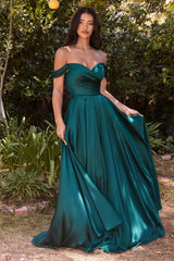 A simple sweetheart neckline gathers around the waistline, flowing into a light slitted skirt