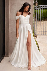 A simple sweetheart neckline gathers around the waistline, flowing into a light slitted skirt.