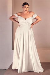 A simple sweetheart neckline gathers around the waistline, flowing into a light slitted skirt.