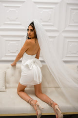 Sequin strapless mini dress with bow in back