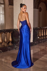 Model wearing a strapless evening gown with a beaded corset bodice, draped satin skirt, and high side slit
