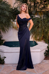 Model wearing a fitted gown with draped mesh overlay and ruched detailing