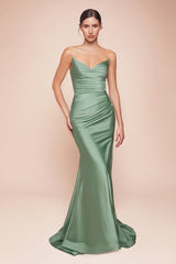 fitted dress features a strapless pointed V-neckline, gathered waistline, and a chic leg slit