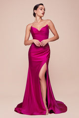 fitted dress features a strapless pointed V-neckline, gathered waistline, and a chic leg slit