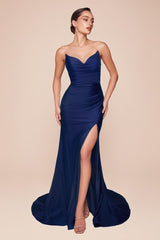 fitted dress features a strapless pointed V-neckline, gathered waistline, and a chic leg slit