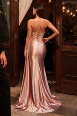 fitted gown is designed to captivate with its plunging neckline, thin straps, and a shimmering embellished bodice adorned with micro crystals