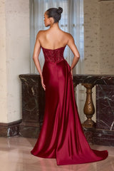 evening gown with a thigh-high slit and dramatic draped side sash