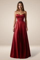 A-line gown features a structured strapless bodice with visible corset seaming and a lace-up back for adjustable support.