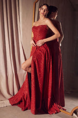 strapless glitter gown with a structured bodice and floor-length A-line skirt featuring a high slit