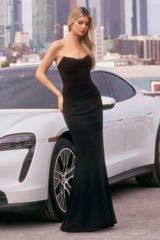 strapless floor-length gown with a fitted silhouette and draped bodice
