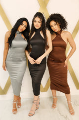 Satin bodycon midi dress with halter neck that ties, low back, and back slit in chocolate, silver, and black