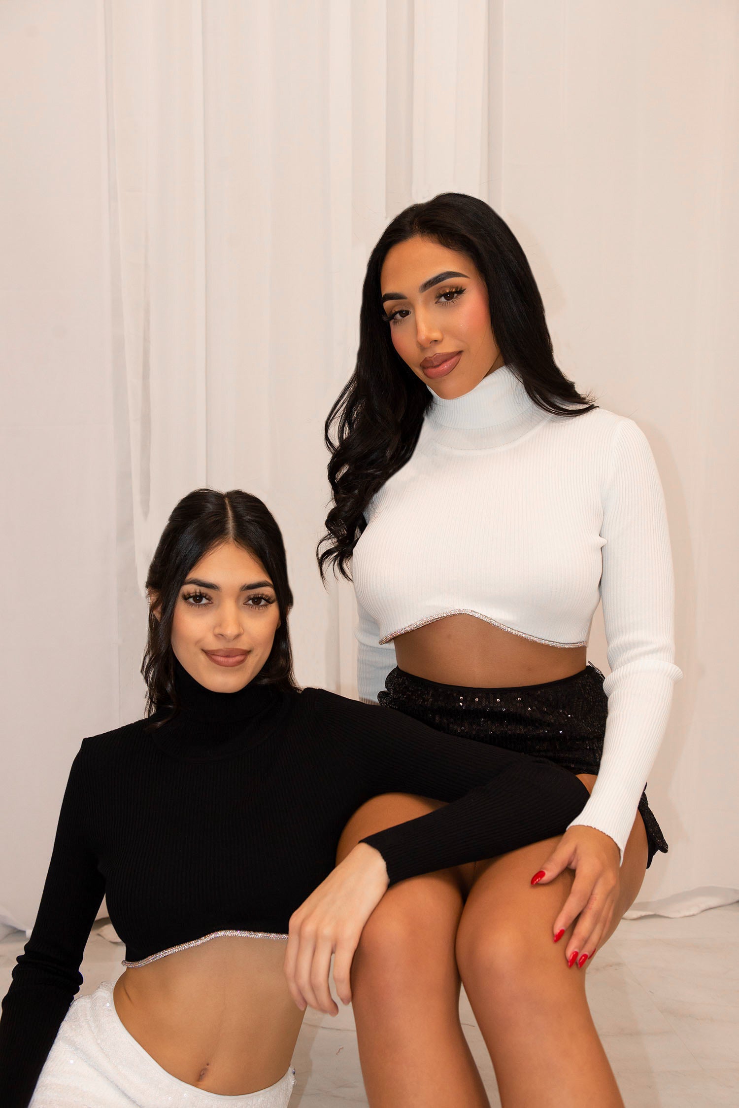 Ribbed long sleeve turtleneck crop top with rhinestone detail