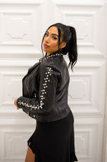 Leather jacket with pearl details