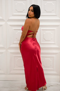 Strapless satin maxi dress with front twist cutout, adjustable tie open back, and back middle slit