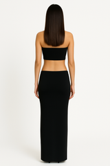 Black cutout dress with chains.