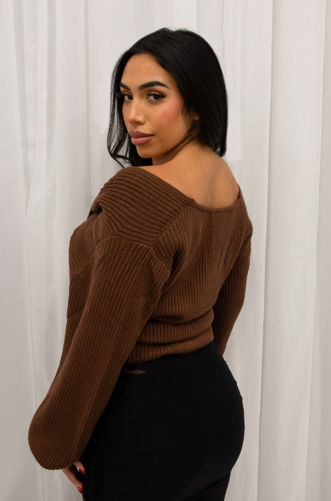 Oversized knitted long sleeve sweater with front twist