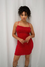 Pearl embellished mini dress with cowl neck and adjustable criss cross open back