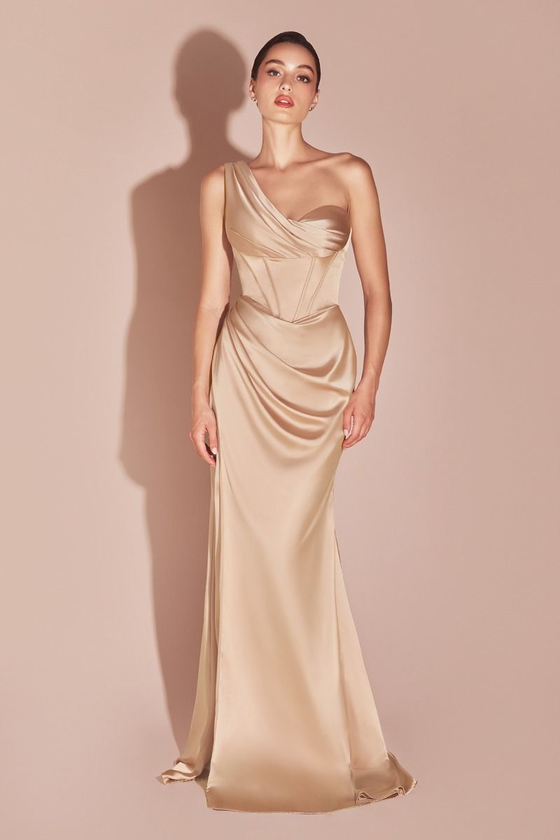 fitted gown showcases a one-shoulder pleated neckline with a gathered waistline and a leg slit