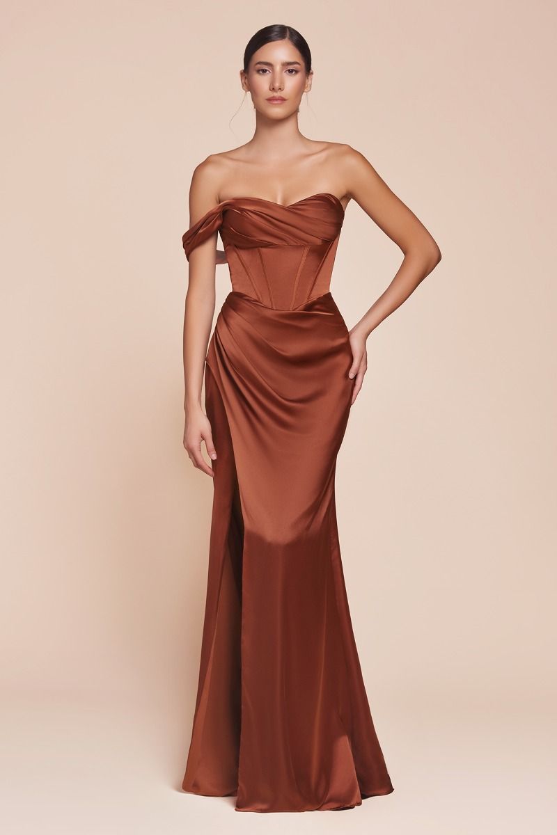 fitted gown showcases a one-shoulder pleated neckline with a gathered waistline and a leg slit