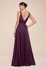 A-line dress features a deep V-neckline and an empire waistline