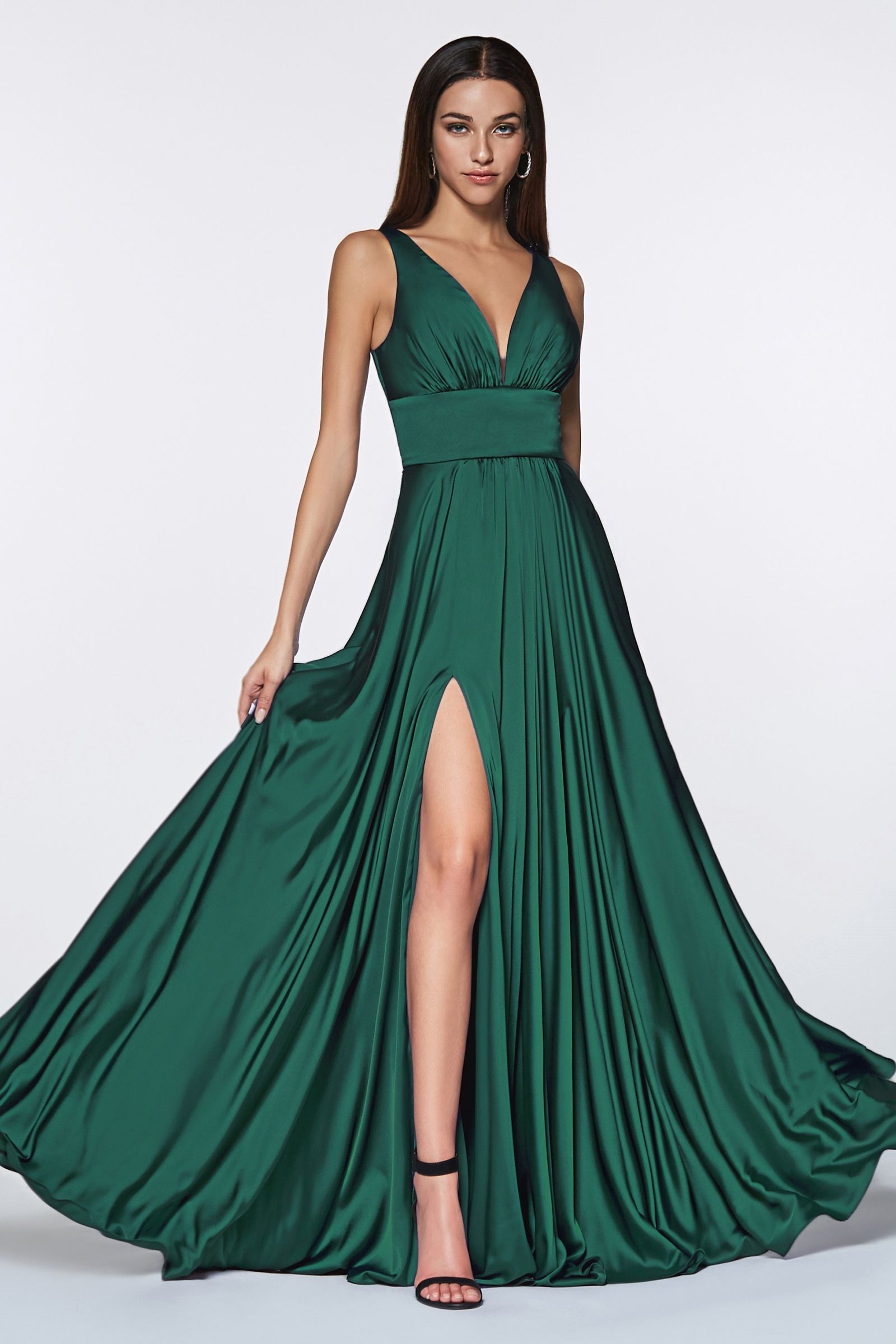 A-line dress features a deep V-neckline and an empire waistline