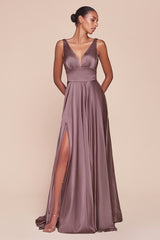 A-line dress features a deep V-neckline and an empire waistline