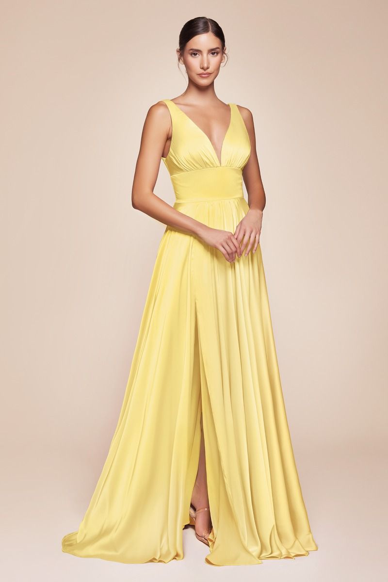 A-line dress features a deep V-neckline and an empire waistline