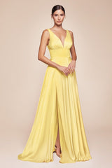 A-line dress features a deep V-neckline and an empire waistline
