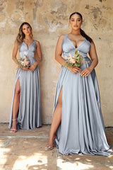 A-line dress features a deep V-neckline and an empire waistline