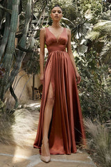 A-line dress features a deep V-neckline and an empire waistline