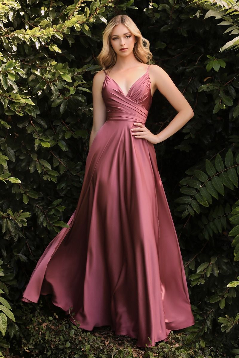 this dress features a sweetheart neckline and a flowy skirt with an elegant leg opening