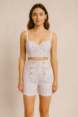 White tweed push up bustier paired with a matching tweed high waisted shorts.