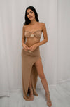 Strapless bandeu with gold metal detail and matching high slit maxi skirt