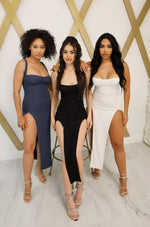 Bodycon midi dress with high slits on both sides in black, white, and teal