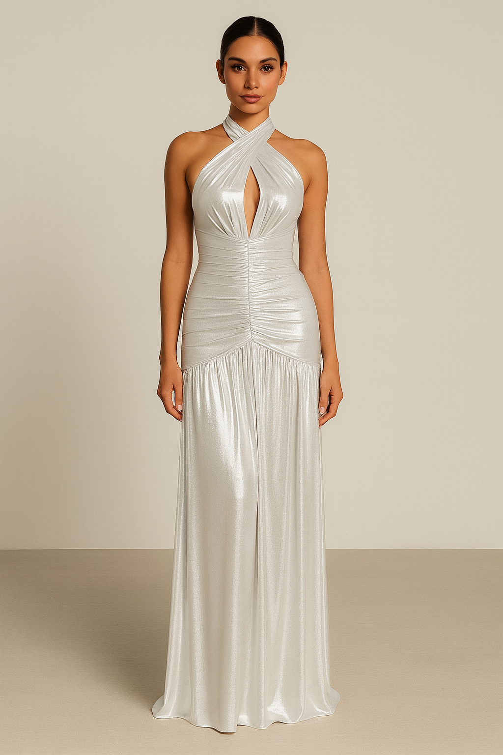 Metallic halter maxi dress with a front keyhole cutout, ruched detailing down the bodice, open tie-back, and a floor-length draped hem.