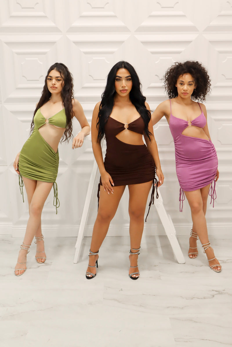 Slinky mini dress with midriff cutout, adjustable straps and adjustable ruching in olive, chocolate, and purple
