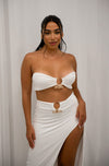 Strapless bandeu with gold metal detail and matching high slit maxi skirt