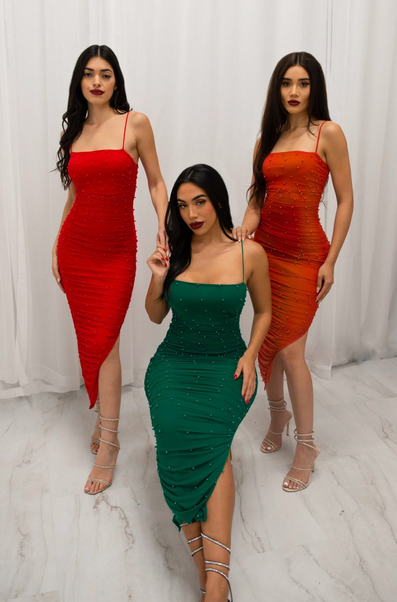 Ruched bodycon maxi dress with side slit, pearl details, and adjustable straps