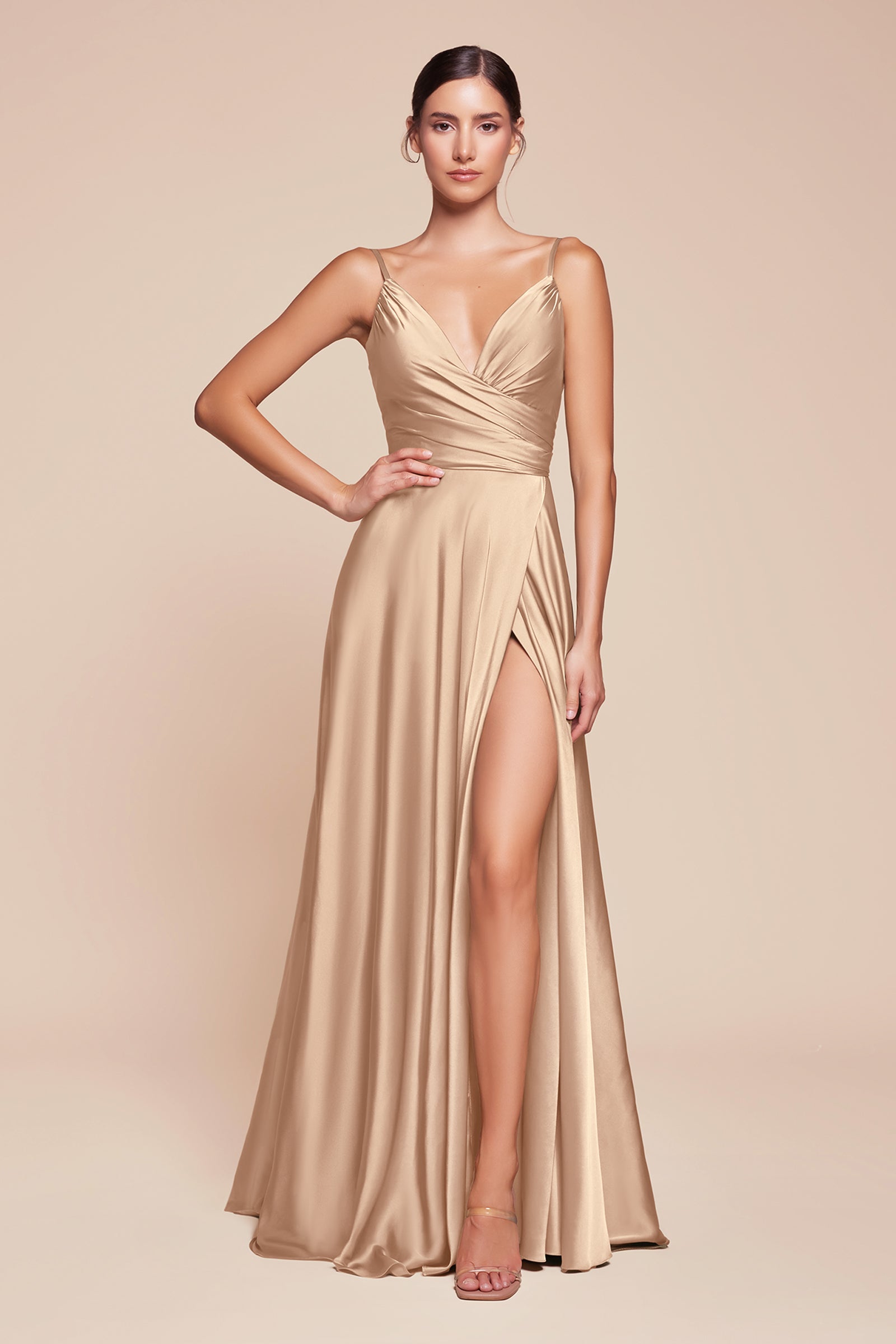 this dress features a sweetheart neckline and a flowy skirt with an elegant leg opening