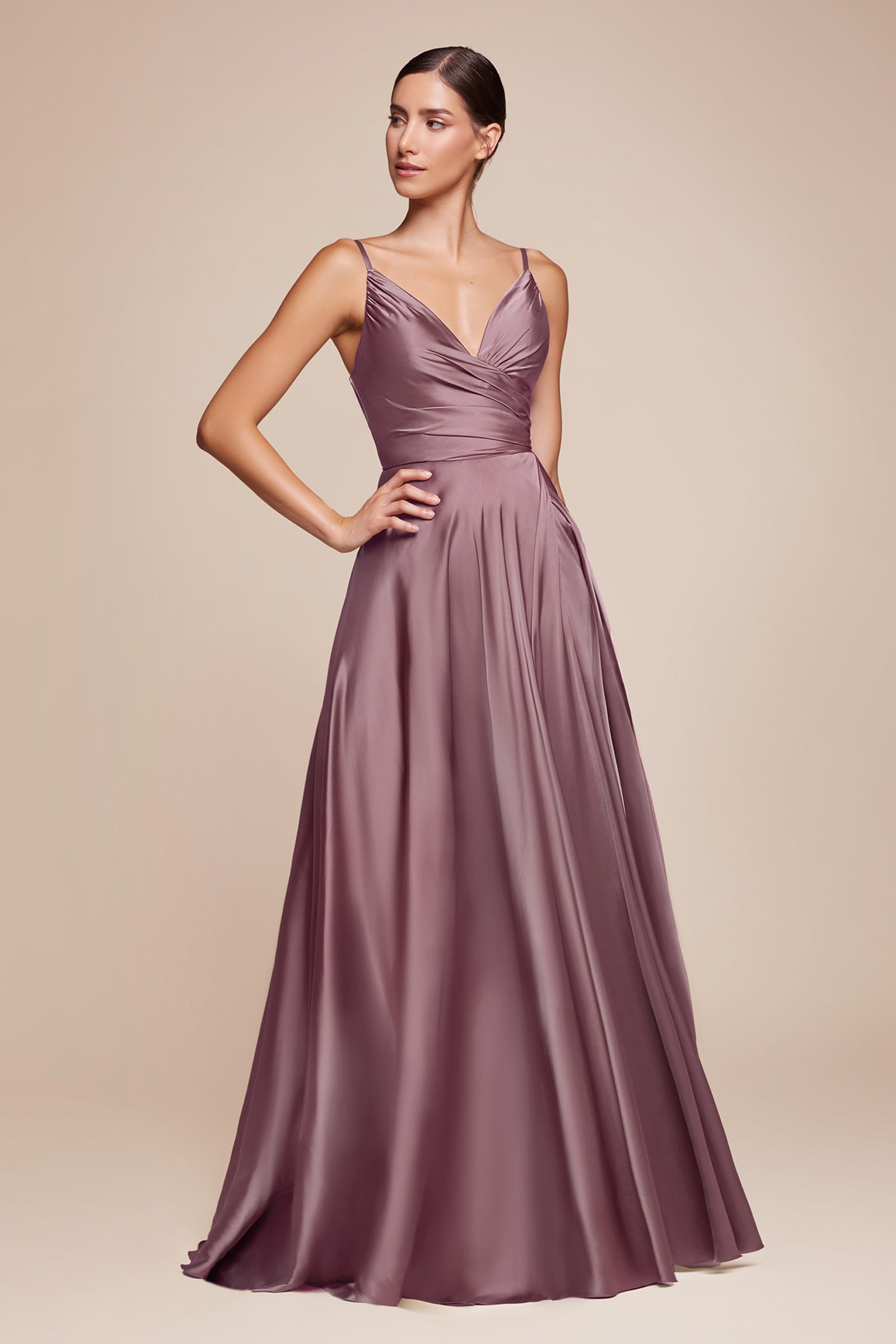 this dress features a sweetheart neckline and a flowy skirt with an elegant leg opening