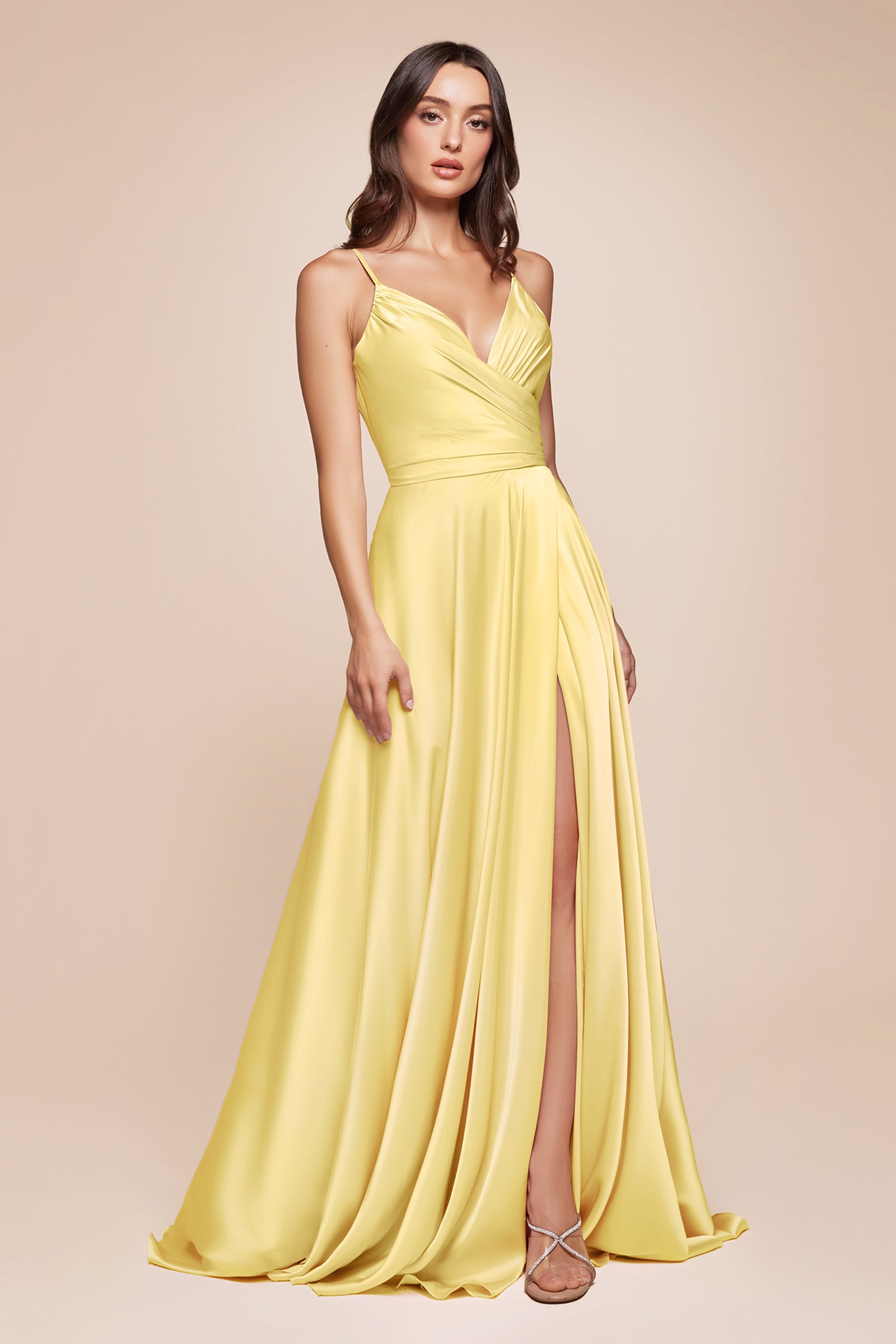 this dress features a sweetheart neckline and a flowy skirt with an elegant leg opening