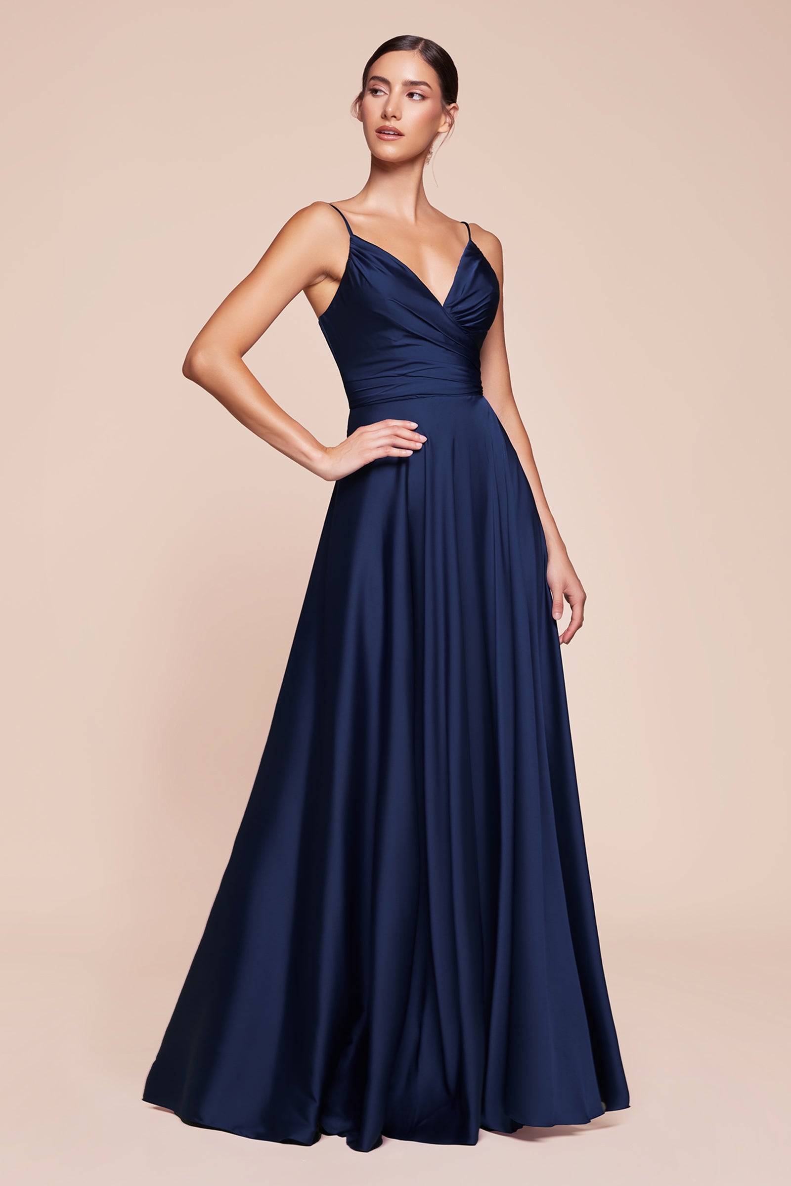 this dress features a sweetheart neckline and a flowy skirt with an elegant leg opening