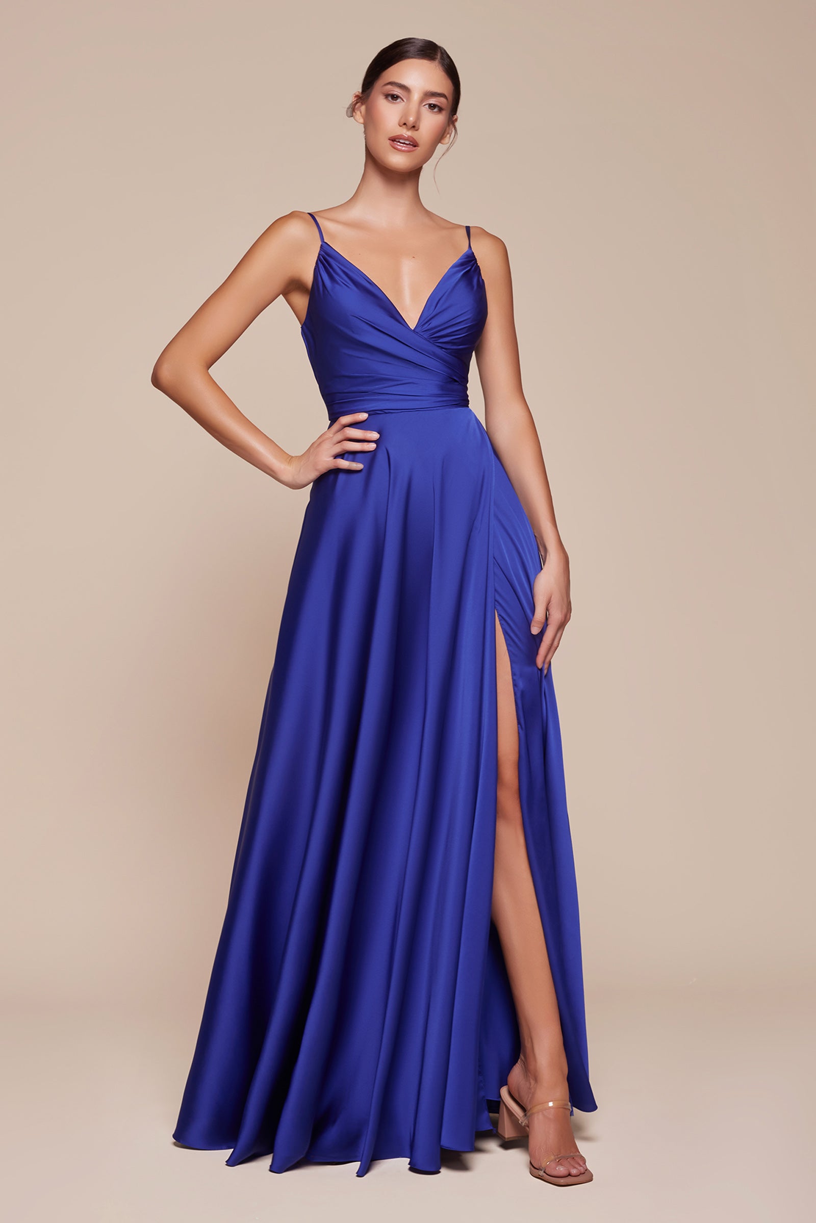 this dress features a sweetheart neckline and a flowy skirt with an elegant leg opening