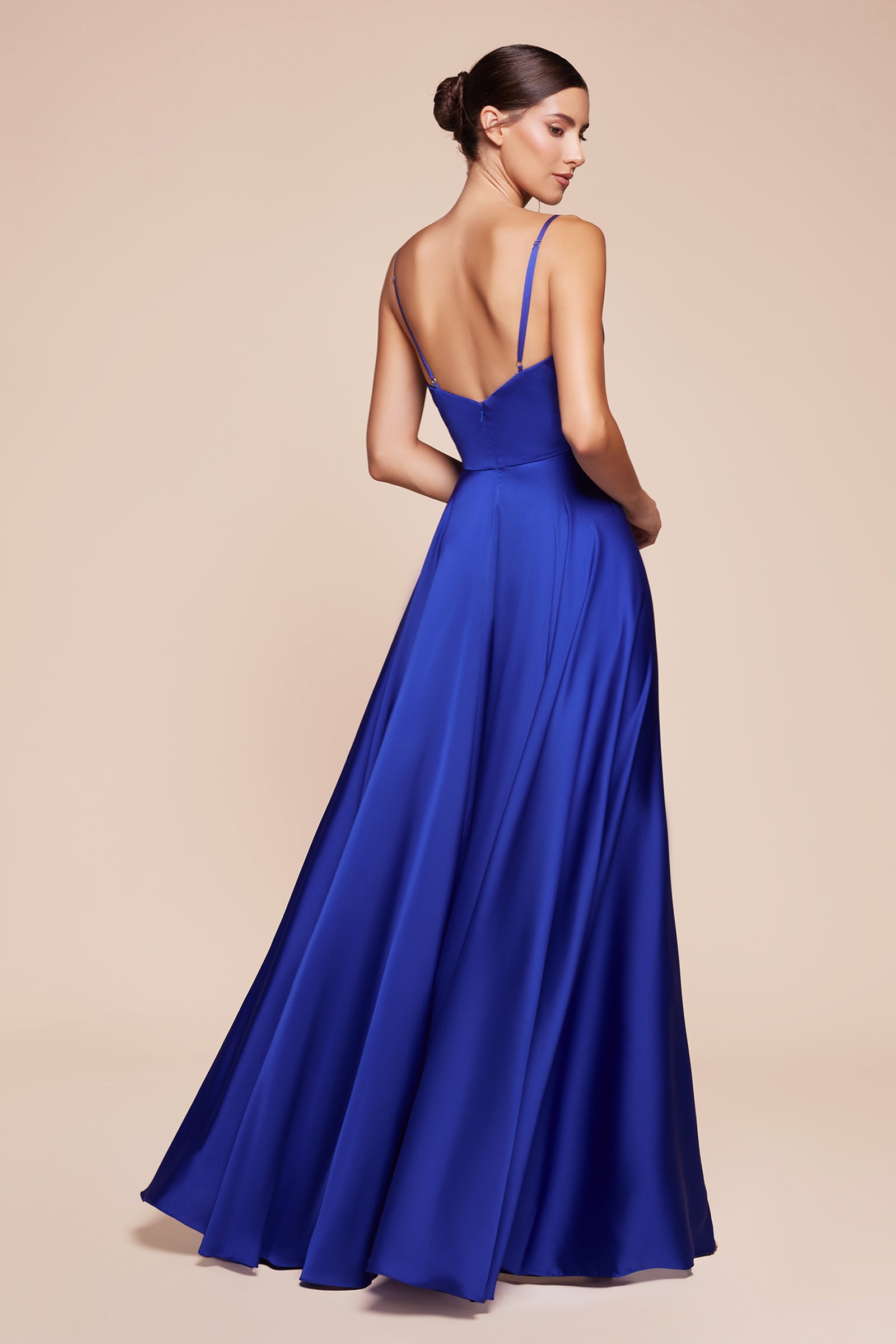 this dress features a sweetheart neckline and a flowy skirt with an elegant leg opening