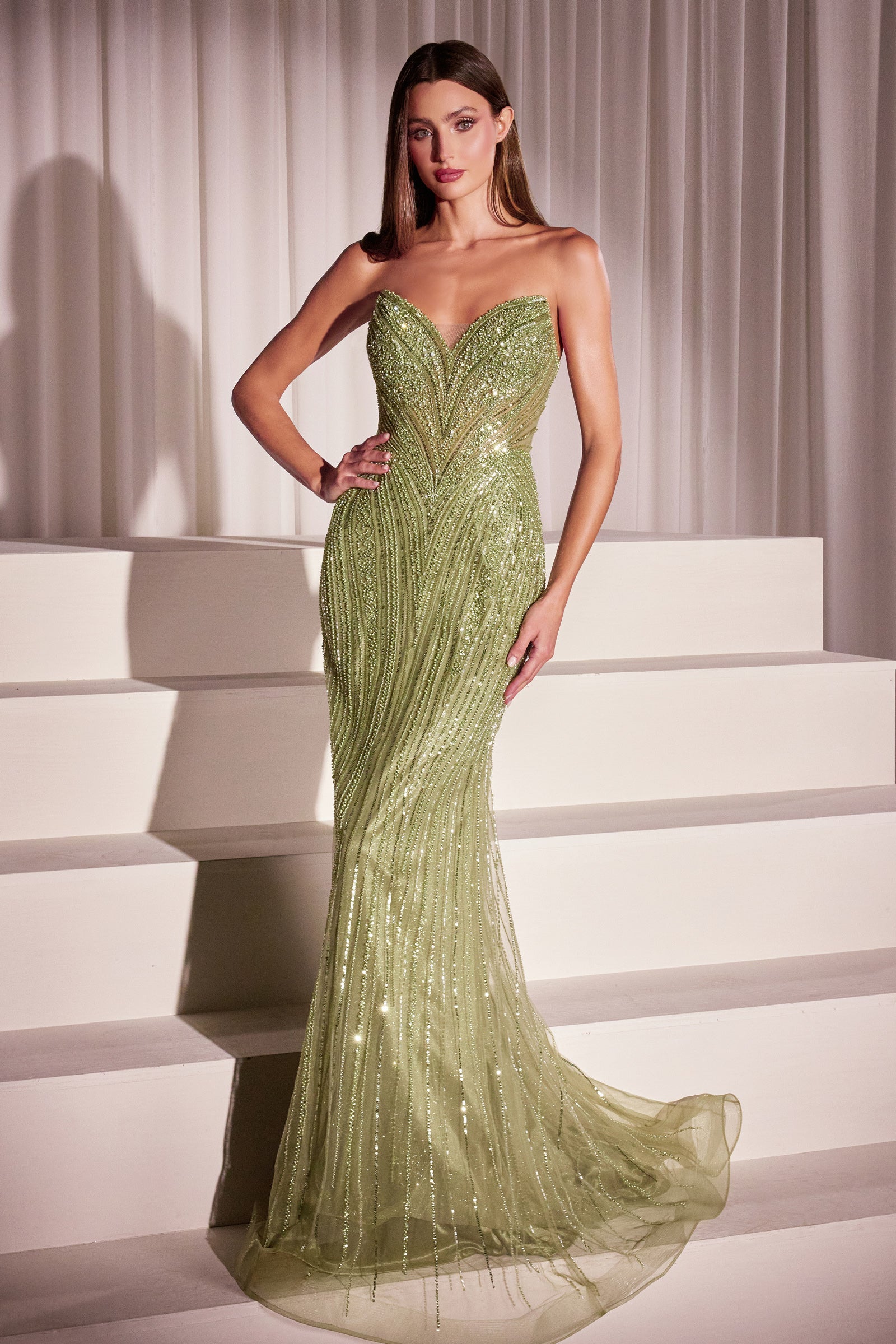 fitted gown featuring a chic halter keyhole neckline and a striking racerback design