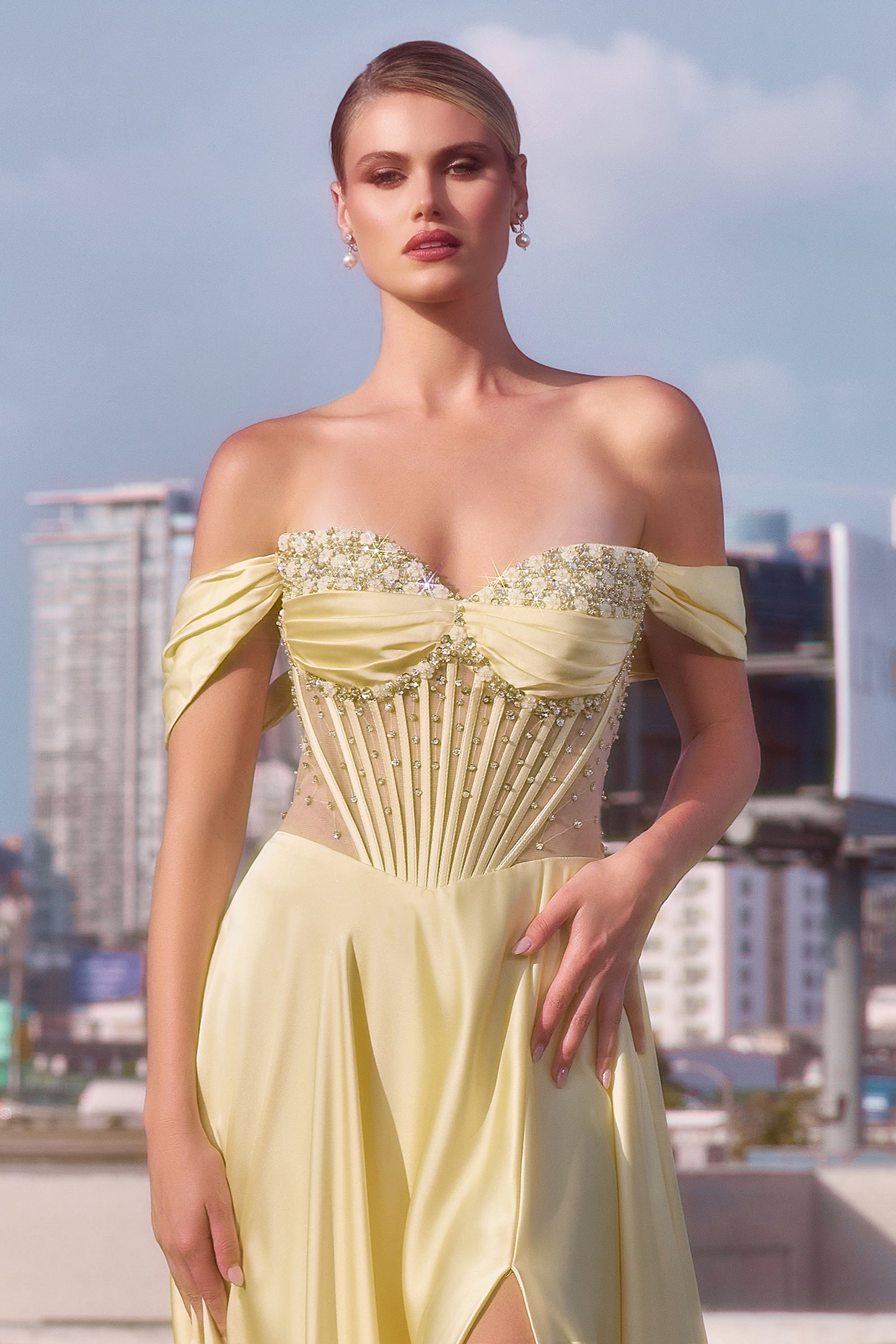 A-line gown combines a strapless sweetheart neckline with removable off-the-shoulder straps 