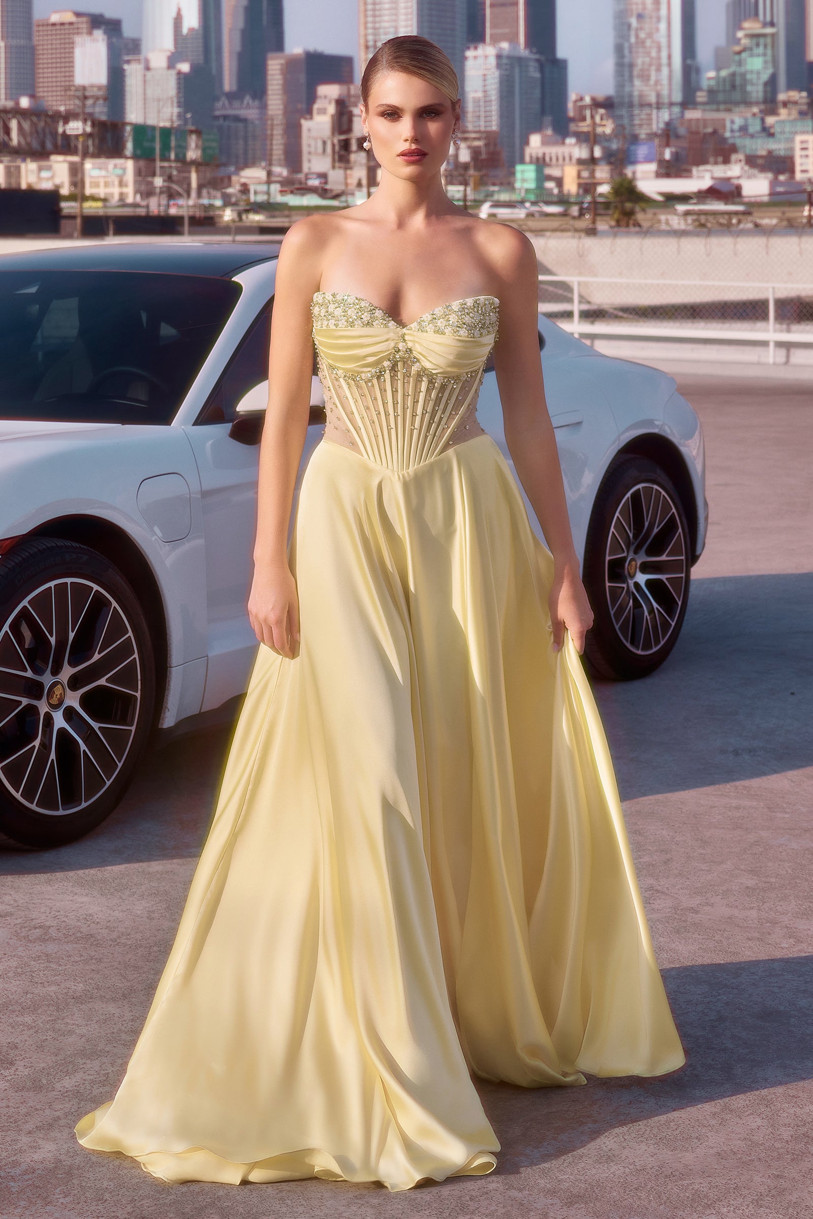 A-line gown combines a strapless sweetheart neckline with removable off-the-shoulder straps 