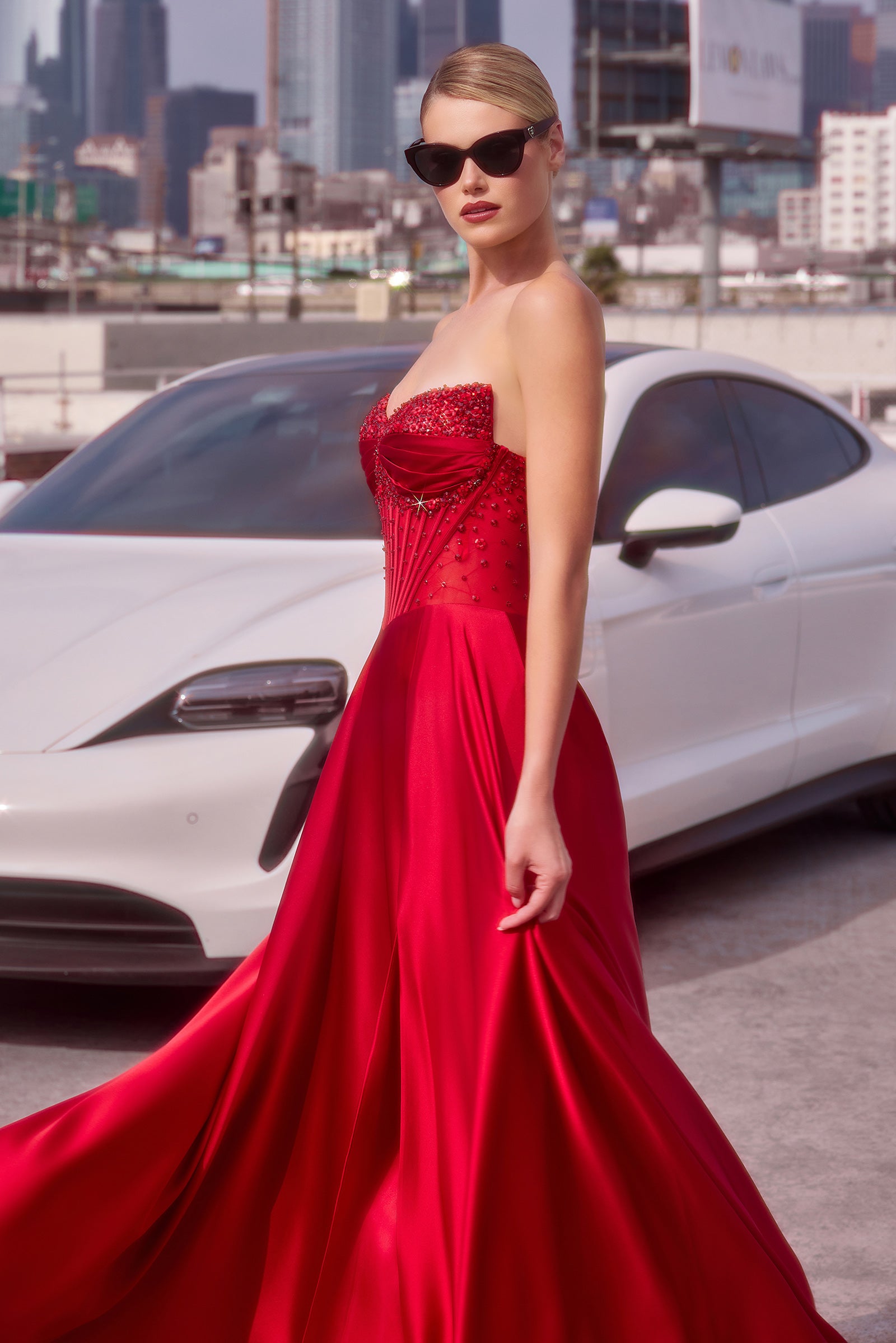 A-line gown combines a strapless sweetheart neckline with removable off-the-shoulder straps 